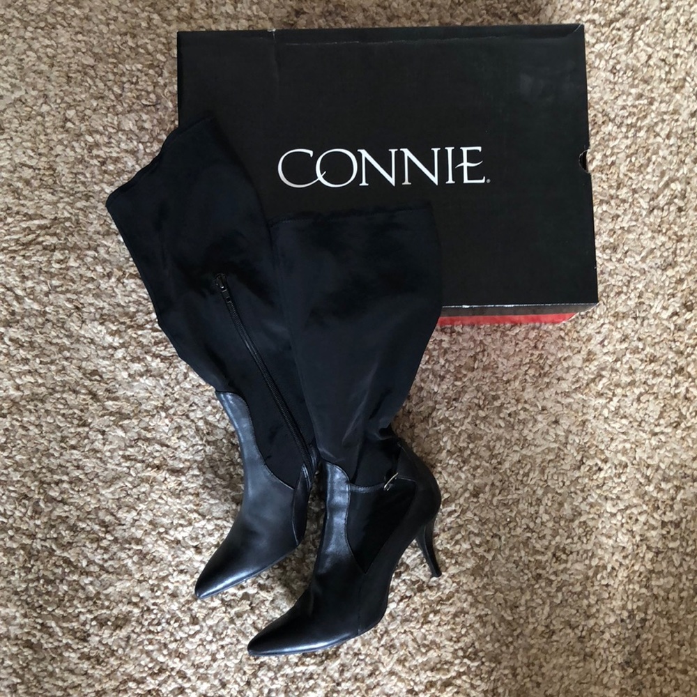 Women’s black heeled boots from Connie